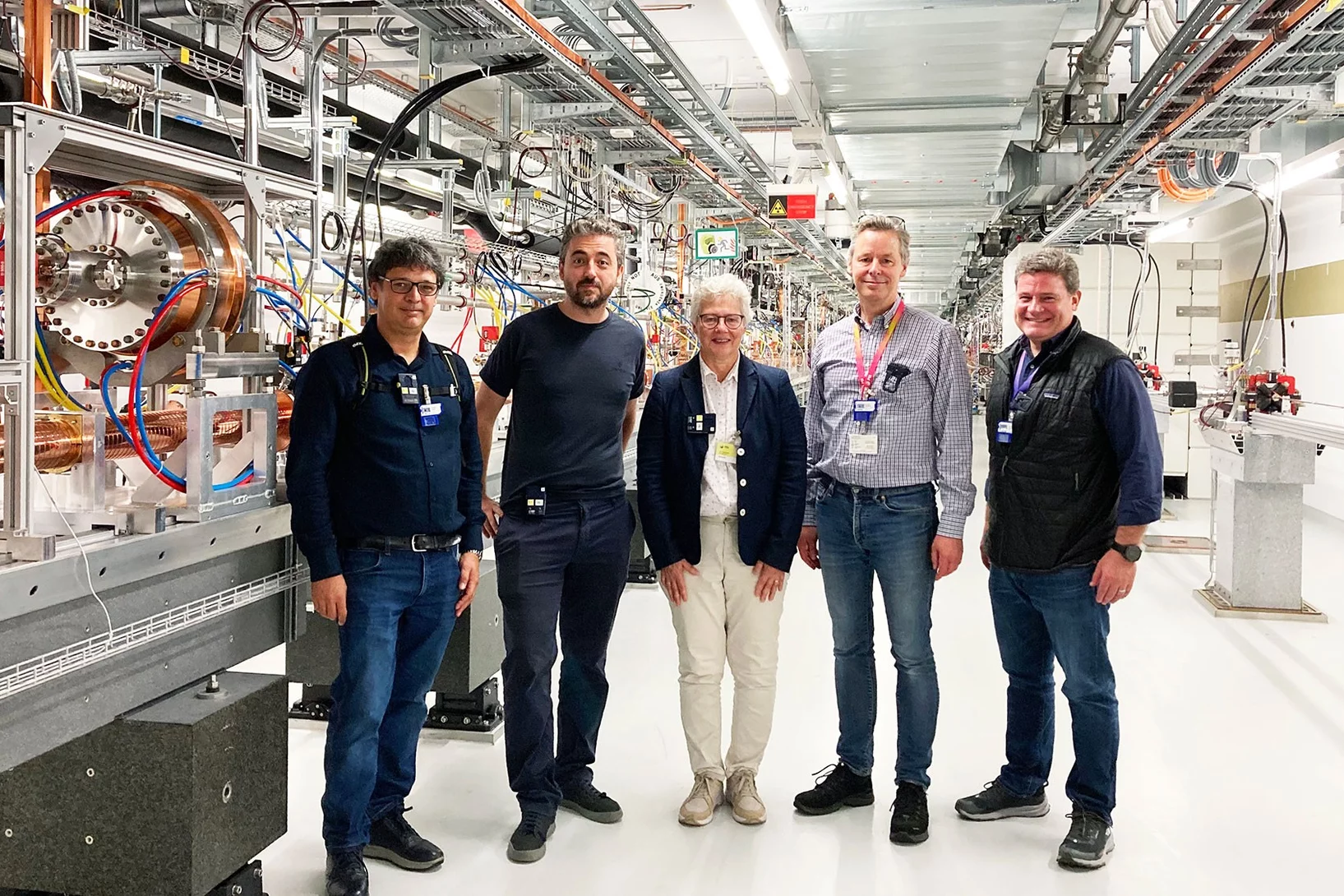 In the accelerator hall of SwissFEL: (L to R) Carlo Vicario, Eduard Prat Costa, Anne L’Huillier, Christoph Bostedt and Adrian Cavalieri.